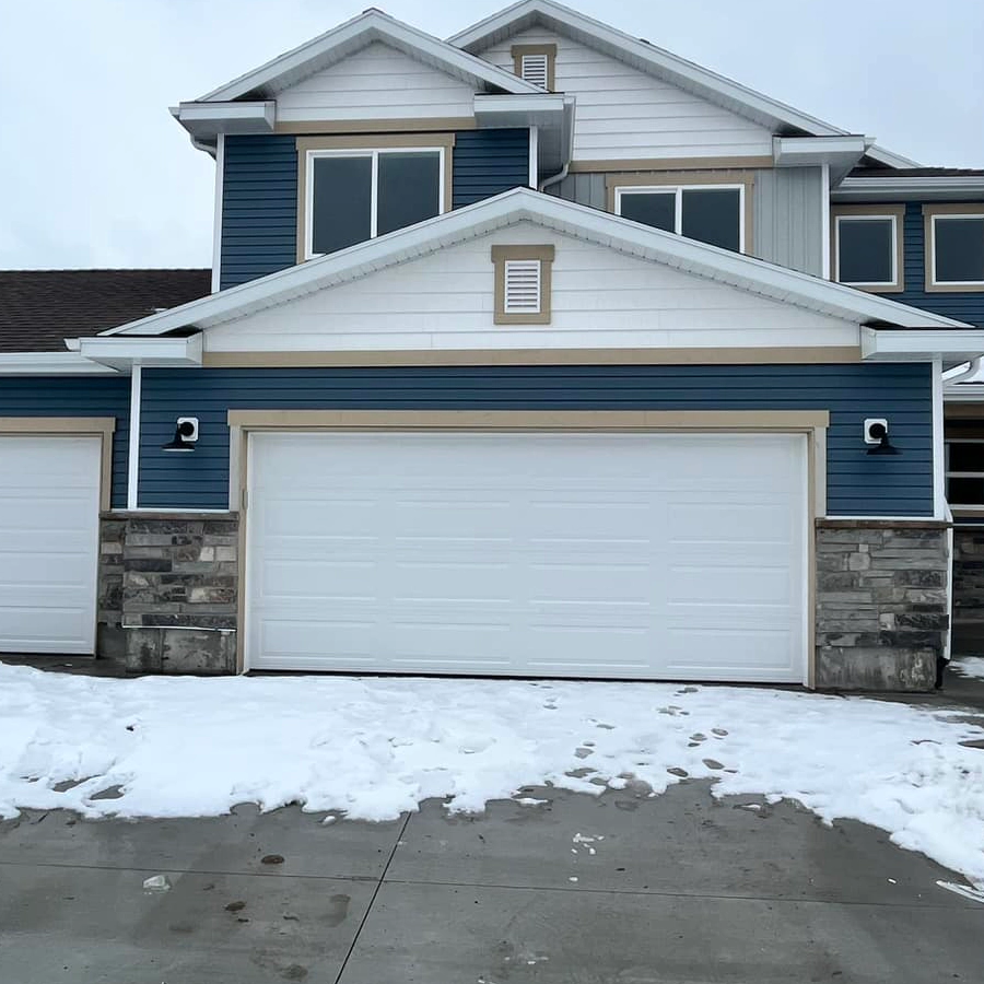 garage door of a house on snowy day